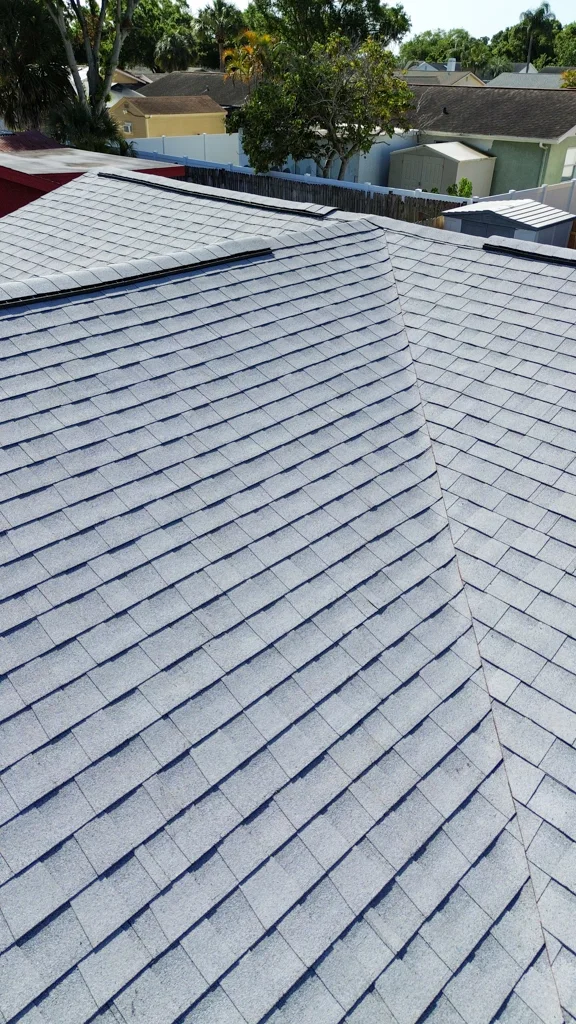 Light gray shingle roof with a ridge vent